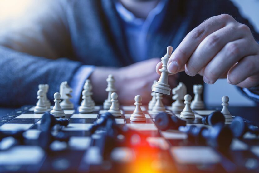Fotografia reklamowa: Jak wysokiej jakości zdjęcia mogą zwiększyć sprzedaż i wzmocnić markę? depth of field photography of man playing chess
